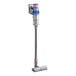 A Dyson V15 Detect cordless stick vacuum cleaner with battery, charger, and tool kit.