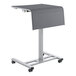 A gray National Public Seating height-adjustable mobile sit / stand desk with wheels.