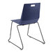 A National Public Seating blue polypropylene chair with black metal legs.