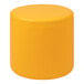 A yellow cylinder shaped stool with a yellow cushion.