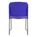 A blue Flash Furniture plastic chair with a metal sled base and full back.