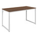A brown and white Flash Furniture Tiverton office desk with a wooden top.