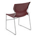 A burgundy Flash Furniture stacking chair with a metal sled base.
