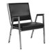 A Flash Furniture black vinyl and chrome steel bariatric reception arm chair.