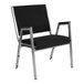 A Flash Furniture black and silver metal bariatric reception arm chair with a black seat.