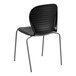 A Flash Furniture black plastic stacking chair with metal legs.