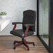 A Flash Furniture black leather office chair with a wooden base.