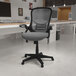 A Flash Furniture Porter light gray office chair with black wheels and armrests.