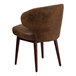 A brown Flash Furniture Comfort Bomber Jacket microfiber chair with wooden legs.