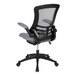 A Flash Furniture Kelista dark gray mesh mid-back office chair with black frame and flip up arms on a white background.