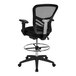 A Flash Furniture black mesh mid-back office chair with black and silver accents.