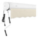 An Awntech linen Key West retractable patio awning with a protective hood.