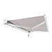 A grey Awntech Key West retractable patio awning with a white protective hood.