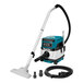 A Makita vacuum cleaner with hose and attachments.