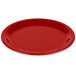 A red round plastic plate with a narrow rim.