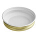 A white plastic lid with a gold metal rim.