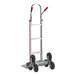 A white and silver Lavex aluminum hand truck with red "U" loop handles.