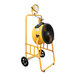 An XPOWER yellow axial fan on a yellow cart with a LED spotlight.