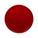 A red round plate with a white background.