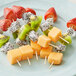 Cubed fruit on Royal Paper bamboo skewers.