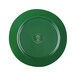 A green plate with a circular design.
