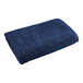 A navy blue 1888 Mills bath towel.