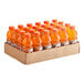 A cardboard box of Gatorade Orange sports drink bottles.