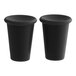 A pair of black plastic Toddy cups with lids.