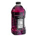 A bottle of Lotus Plant Energy Skinny Purple Lotus 5:1 Energy Concentrate with purple liquid.