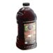 A large jug of Lotus Plant Energy Ruby Red Cascara 5:1 Energy Concentrate with a label.