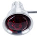 A close up of a Carlisle FlexiGlow single arm bulb warmer heat lamp with a red bulb.
