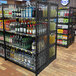 Wanzl Wire Tech single-sided add-on gondola shelving with liquor on the shelves.