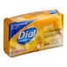 A yellow bar of Dial Gold antibacterial deodorant soap.