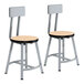 Two National Public Seating metal lab stools with wooden seats and backrests.
