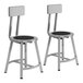 Two National Public Seating metal lab stools with black seats and backrests.