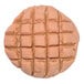 A peanut butter cookie with a waffle grid pattern on it.