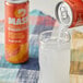 A Boylan Mash Ripe Mango Blood Orange soda can pouring into a glass.