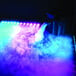 A Chauvet DJ Nimbus dry ice machine with smoke coming out of it.