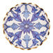 A Sophistiplate paper salad plate with a blue and white Moroccan design and gold rim.