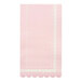 A pink paper towel with white scalloped edges.
