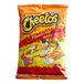 A close up of a 2 oz. bag of Cheetos Flamin' Hot Cheese Flavored Snacks.