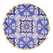 A blue and white paper dinner plate with a Moroccan design and gold trim.