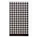 A Sophistiplate Blanc & Noir paper guest towel with a black and white houndstooth pattern.