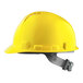 A yellow Lift Safety hard hat with a grey suspension strap.