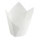 A Baker's Mark white paper tulip baking cup with a folded top.