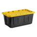A black and yellow Tough Box plastic storage tote with a lid.