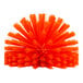 An orange Carlisle Sparta pipe and valve brush with plastic bristles.