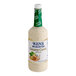 A plastic bottle of Ken's creamy Caesar dressing with a white label.