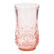 A Sophistiplate blush pink plastic tumbler with a cut out design.