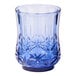 A Sophistiplate cobalt blue plastic tumbler with a star pattern.